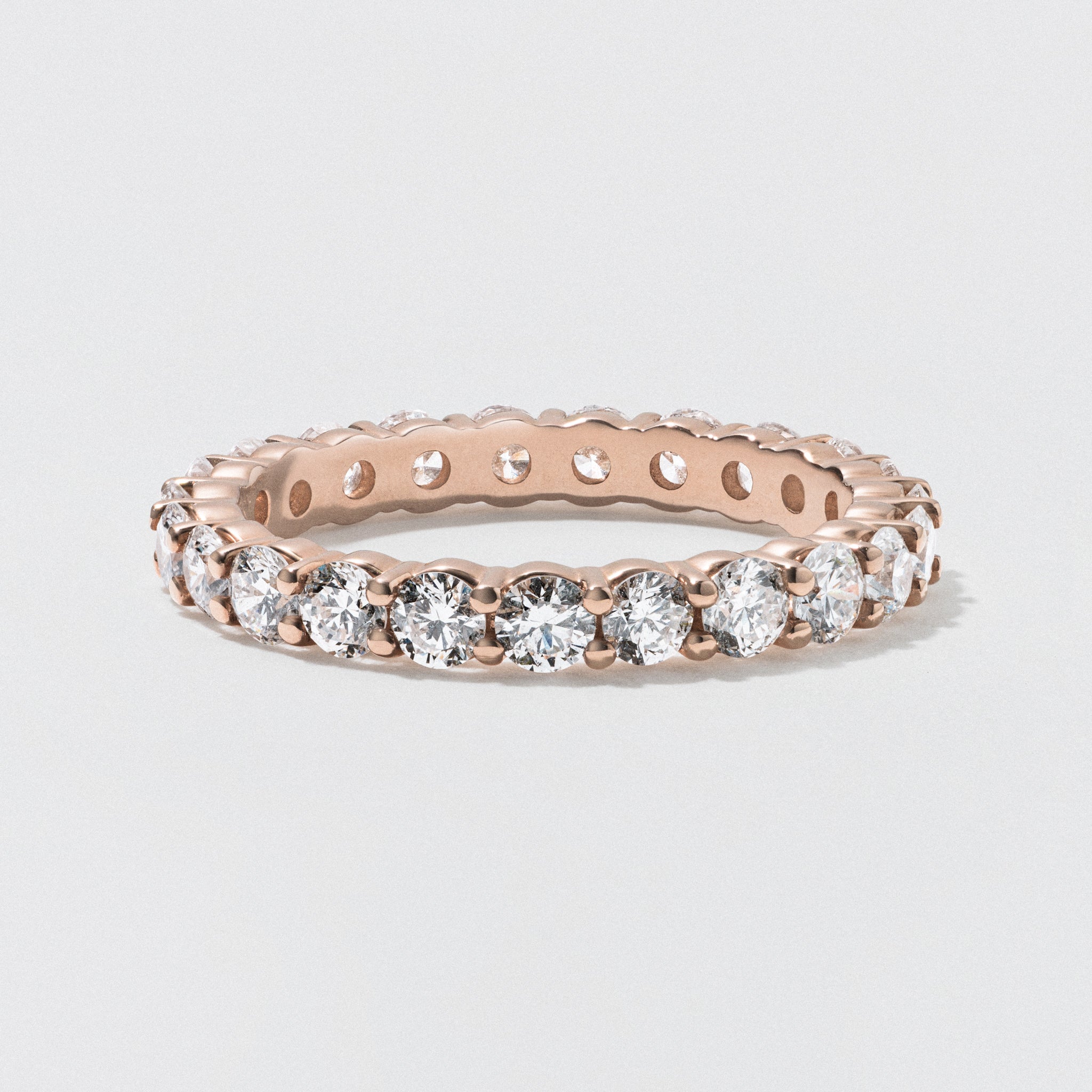 Floating diamond eternity on sale band rose gold